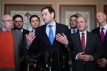 US Senator Marco Rubio speaks on Capitol Hill after a meeting with Venezuelans including Carlos Vecchio (second from left), the charge d'affaires of the embassy in Washington after the United States switched recognition