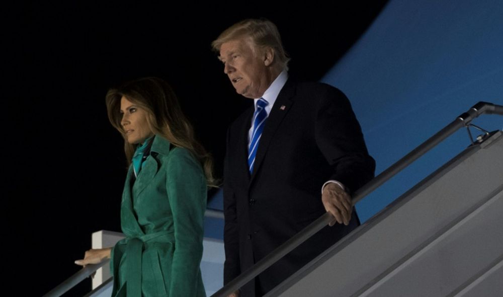 US President Donald Trump and First Lady Melania Trump arrive on Air Force One at Warsaw Chopin Airport in Warsaw, Poland, July 5, 2017, as they begin a 4-day trip to Poland and Germany