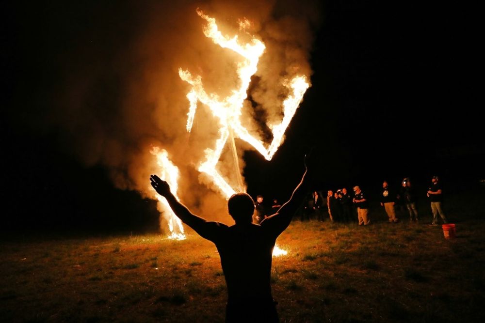 Amid a rise in reported antisemitic acts in the US, neo-Nazis in the state of Georgia burned a swastika on April 21, 2018.