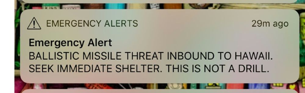 This photo illustration of a screenshot taken by the photographer of his cell phone shows messages of emergency alerts on January 13, 2018 of Honolulu, Hawaii