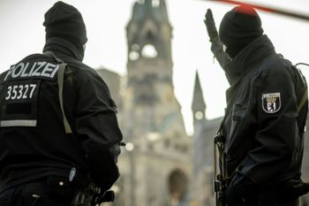 German police patrol near Berlin's Kaiser Wilhelm Memorial Church on December 21, 2016