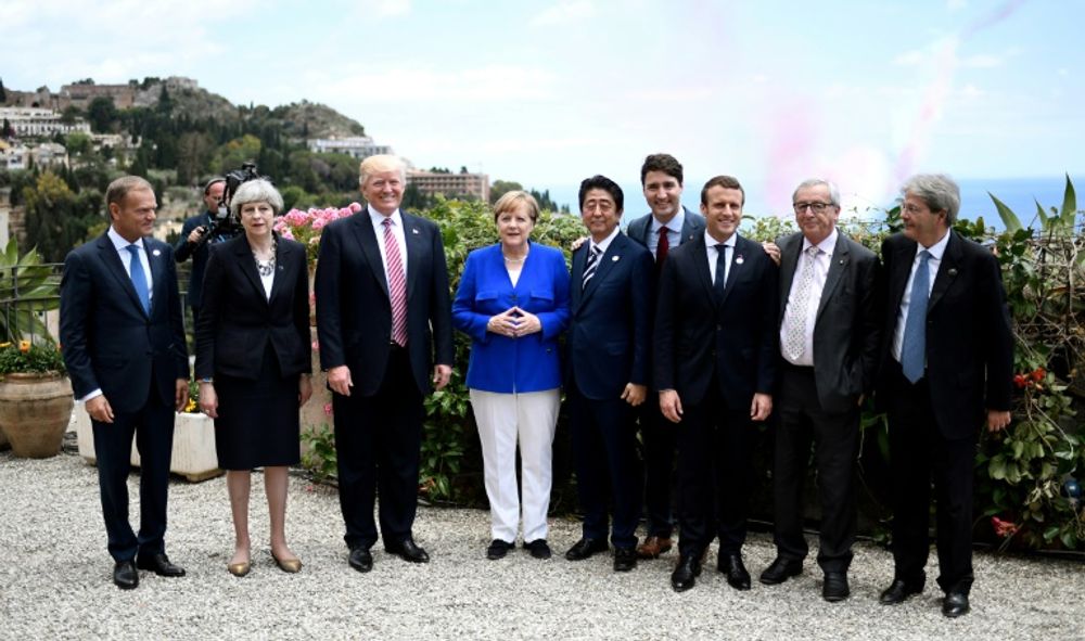 Donald Tusk, Theresa May, Donald Trump, Angela Merkel, Shinzo Abe, Justin Trudeau, Emmanuel Macron, Jean-Claude Juncker et Paolo Gentioloni, réunis au G7 à Taormina, en Italie, le 26 mai 2017 