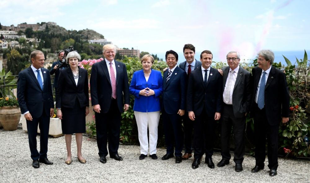 Donald Tusk, Theresa May, Donald Trump, Angela Merkel, Shinzo Abe, Justin Trudeau, Emmanuel Macron, Jean-Claude Juncker et Paolo Gentioloni, réunis au G7 à Taormina, en Italie, le 26 mai 2017