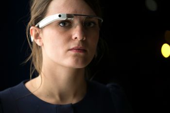 A woman wears Google glass in Paris on November 6, 2014