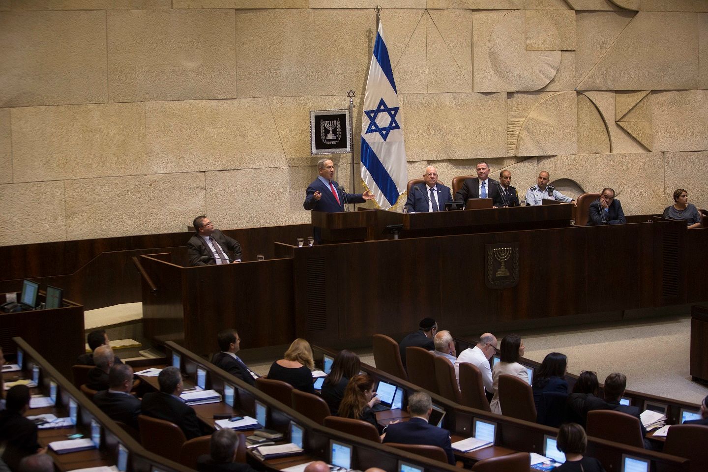 FILE - Israeli Prime Minister, Benjamin Netanyahu, gestures during a speech at the Knesset, Israel's Parliament in Jerusalem, Monday, Oct. 31, 2016.