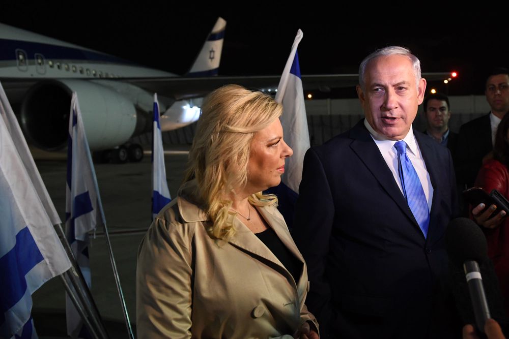 Prime Minister Benjamin Netanyahu and wife Sara at Ben Gurion Airport in Israel.