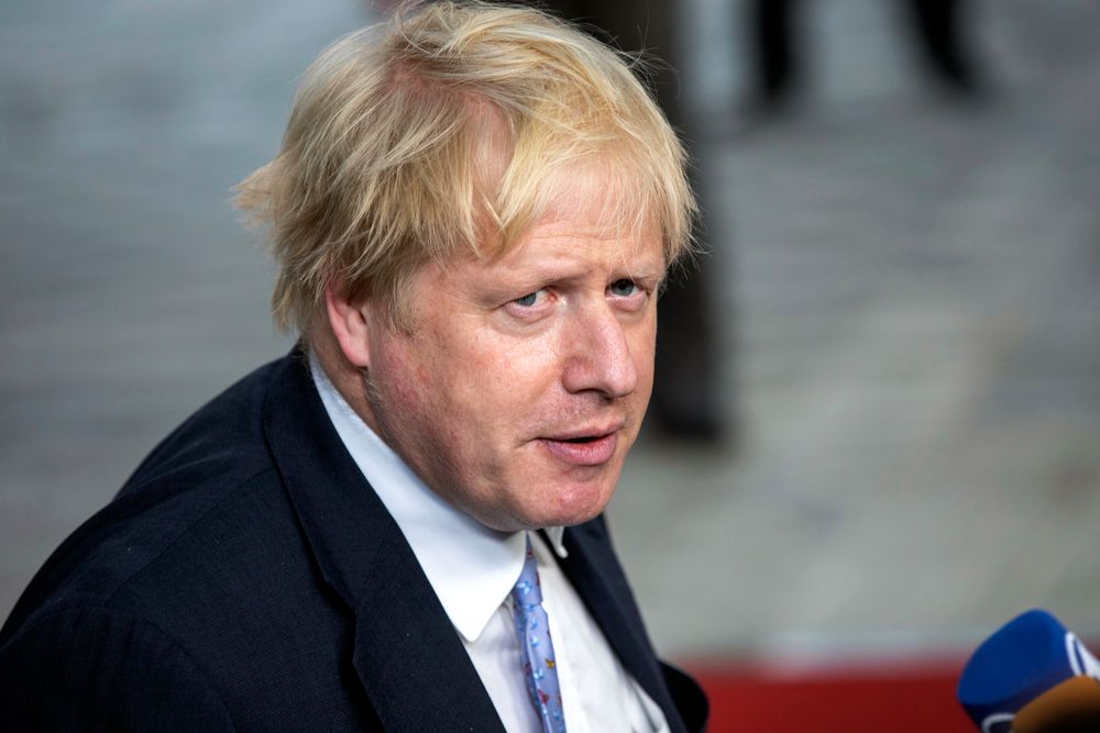 British Foreign Secretary Boris Johnson addresses reporters at the European Council building in Brussels, Tuesday, May 15, 2018.