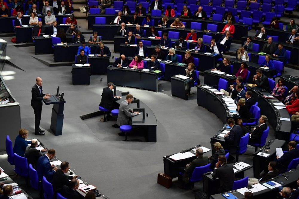 Ralph Brinkhaus, leader of the conservative CDU/CSU parliamentary group addresses the Bundestag, the lower house of parliament, on October 17, 2018 in Berlin