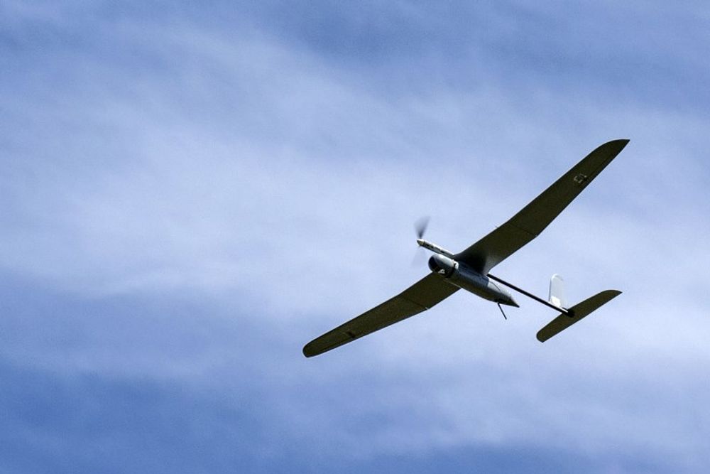 An Israeli army's Skylark I (Rochev Shamayim) unmanned drone aircraft used for monitoring purposes flies along the border between Israel and Lebanon, on April 21, 2014