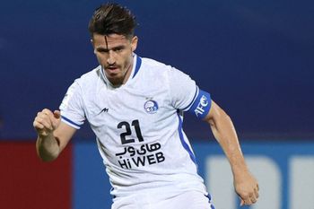 Esteghlal's defender Voria Ghafouri plays during the AFC Champions League group C match at the King Abdullah sport city stadium in the Saudi city of Jeddah.