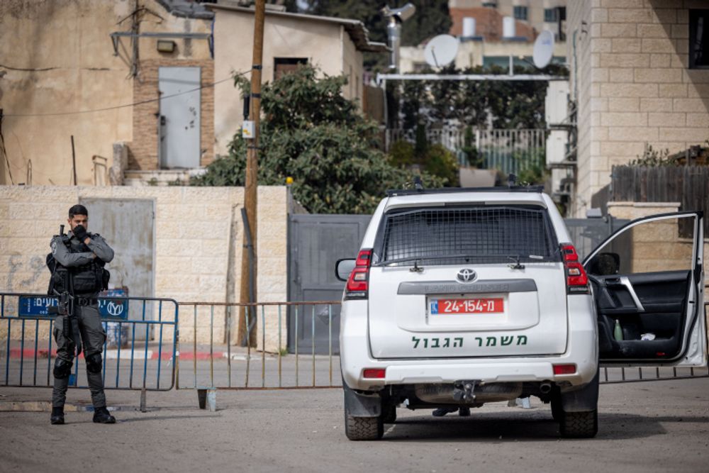 Israeli border police officers stand watch in the east Jerusalem neighborhood of Sheikh Jarrah, February 17, 2022.