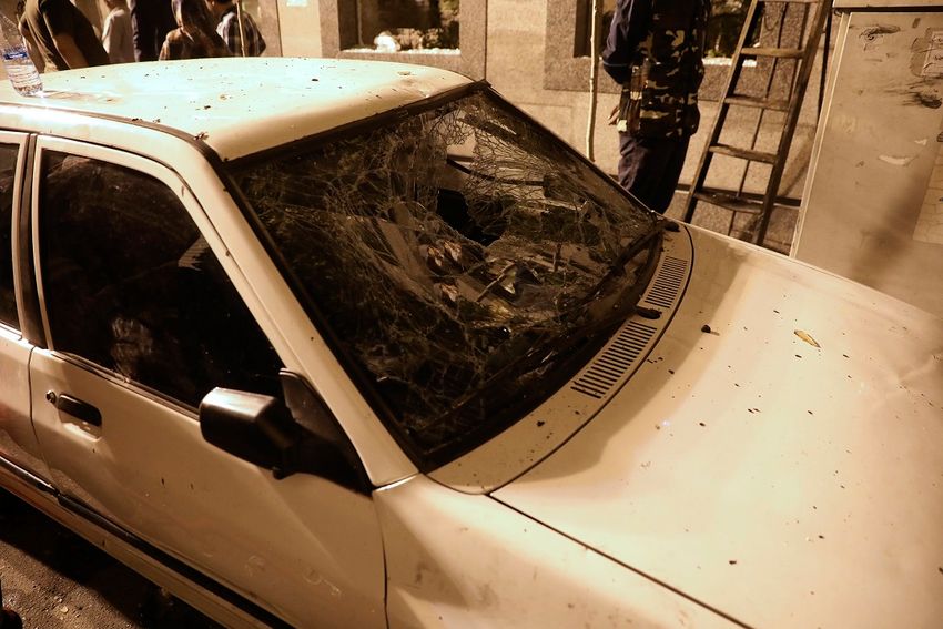 FILE - A vehicle's windshield is shattered by a wave of the explosion of the Sina Athar Clinic in Tehran, Iran, reportedly from a gas leak, on July 1, 2020.