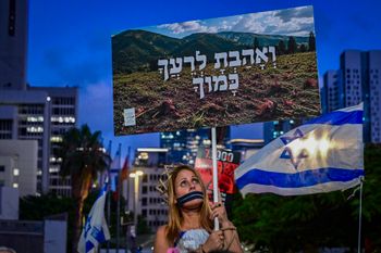 Protesters take part in a rally in Tel Aviv during events marking the 1,000th day since the October 7 massacre, July 2, 2026.