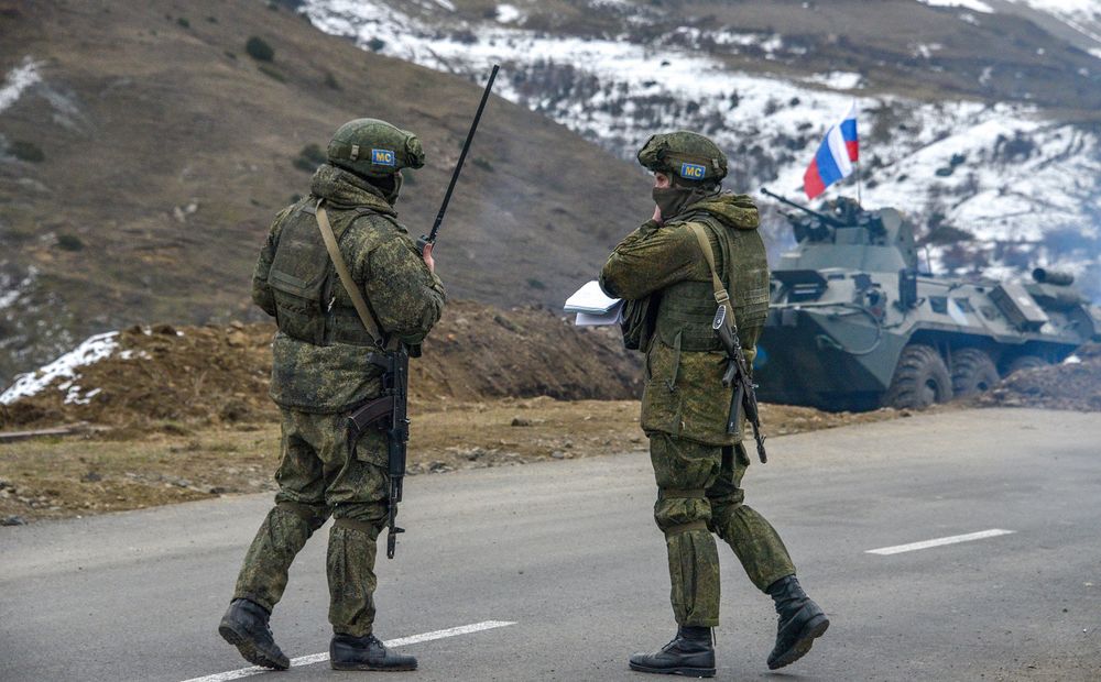 Soldiers of the Russian peacekeeping force man a checkpoint outside the town of Shusha, in the disputed Nagorno-Karabakh region of Azerbaijan