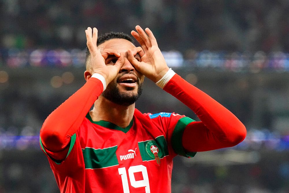 Morocco's Youssef En-Nesyri celebrates after scoring his side's only goal during the World Cup quarterfinal soccer match against Portugal in Doha, Qatar, on December 10, 2022.
