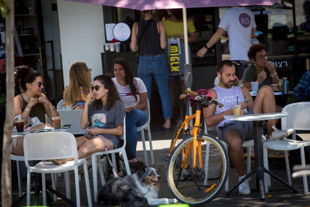 Young Israelis at a Tel Aviv café on May 23, 2021.