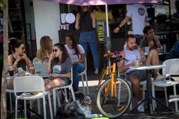 Young Israelis at a Tel Aviv café on May 23, 2021.