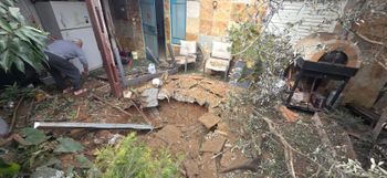 MDA The scene of an interception fragment impact in the courtyard of a house in Rishon LeZion