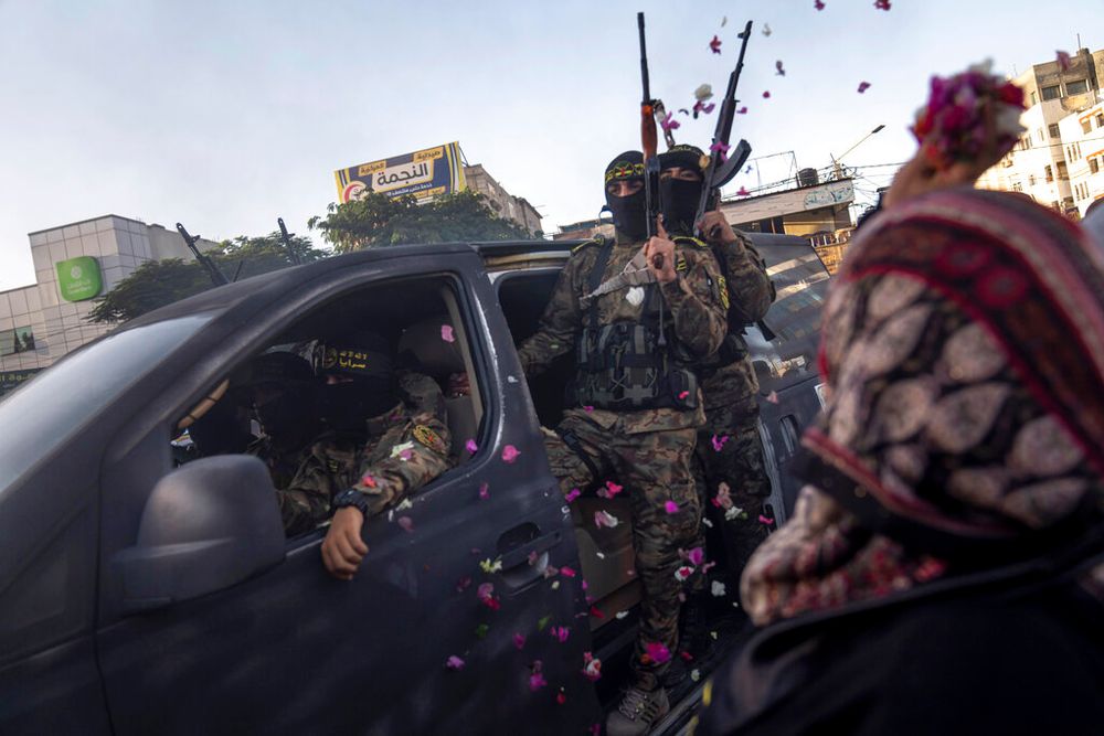 Islamic Jihad militants take part in an anti-Israel rally in Rafah, Gaza Strip.