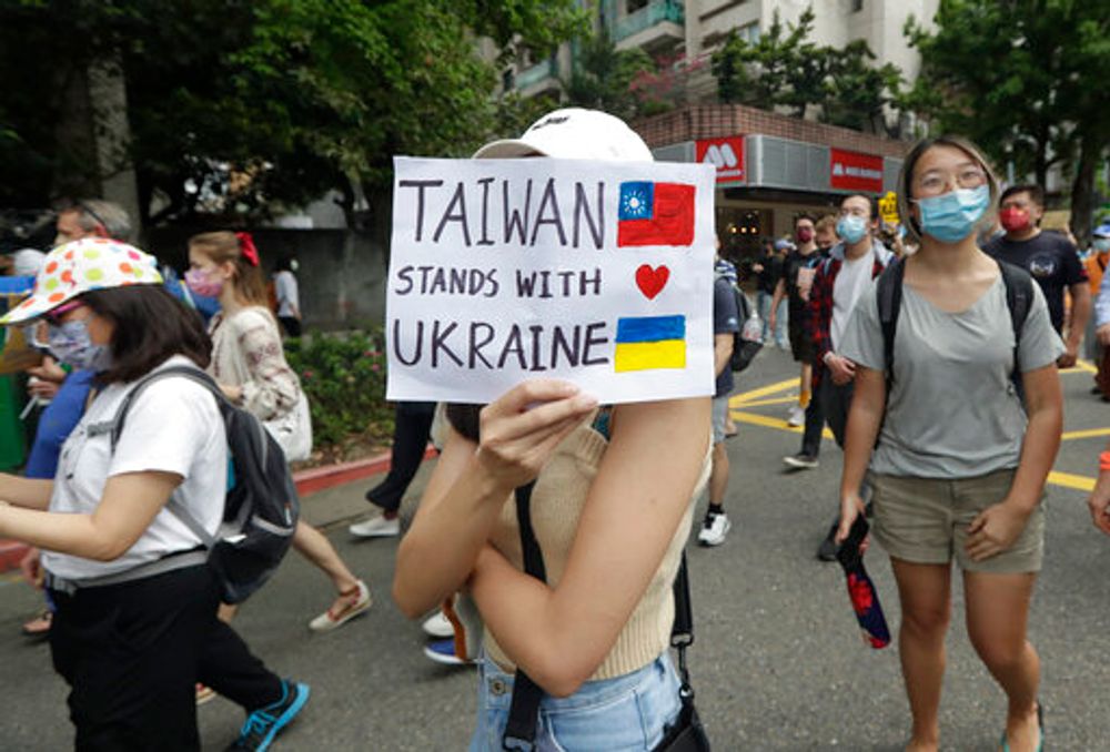 Ukrainian nationals and those against the invasion of Russia protest in Taipei, Taiwan, on March 13, 2022.