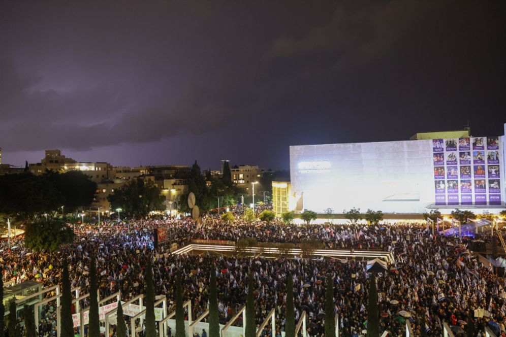 Thousands of Israelis protest against the current Israeli government at Habima Square in Tel Aviv on January 14, 2023.