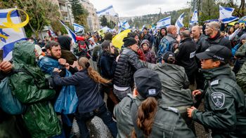 Law enforcement and protesters clash outside Prime Minister Benjamin Netanyahu's residence in Jerusalem