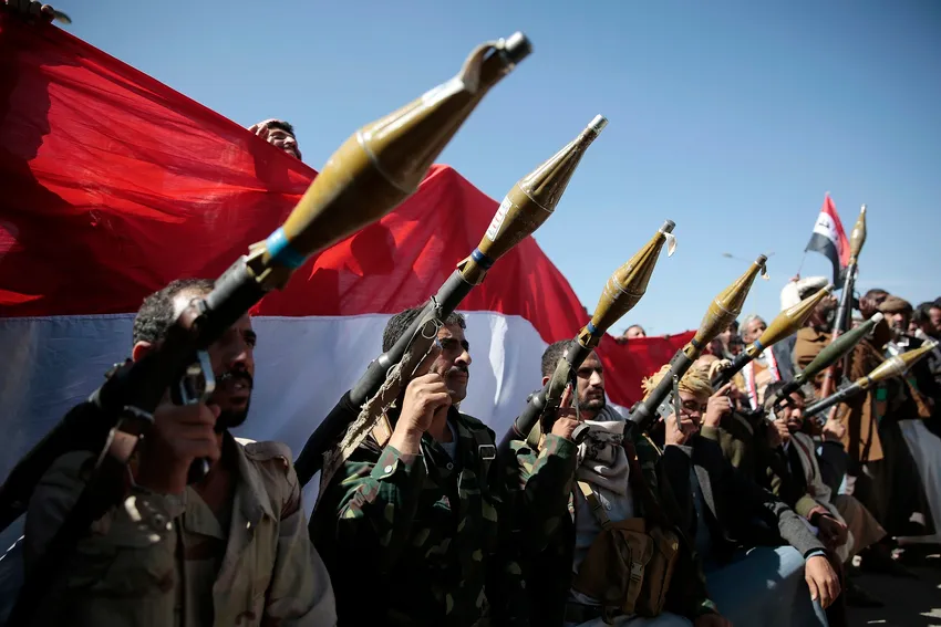 Tribesmen loyal to Houthi rebels hold their weapons as they pose for a photo during a gathering aimed at mobilizing more fighters into battlefronts in several Yemeni cities, in Sanaa, Yemen, Thursday, Nov. 24, 2016.