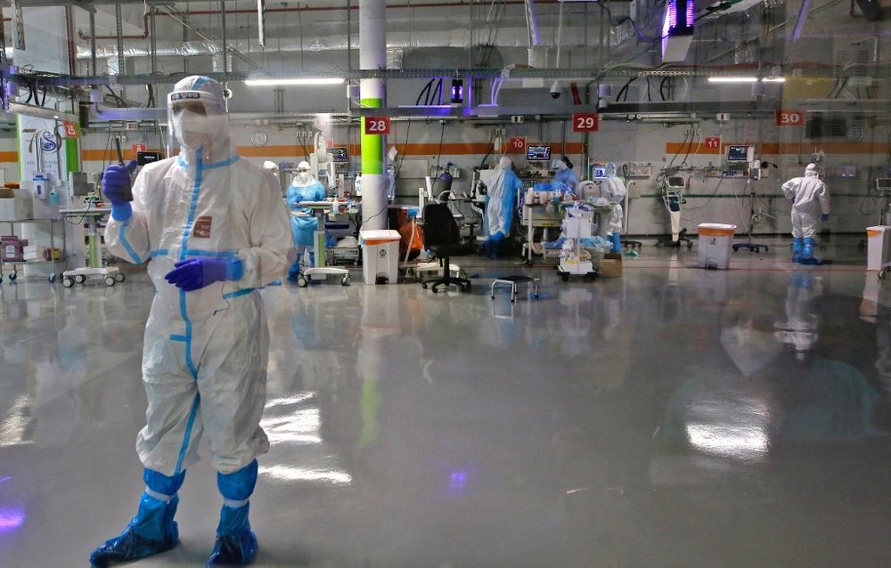 Medical staff work in the COVID-19 isolation ward of Sheba Medical Center, Israel's largest hospital, in Ramat Gan near the coastal city of Tel Aviv, on June 30, 2020.
