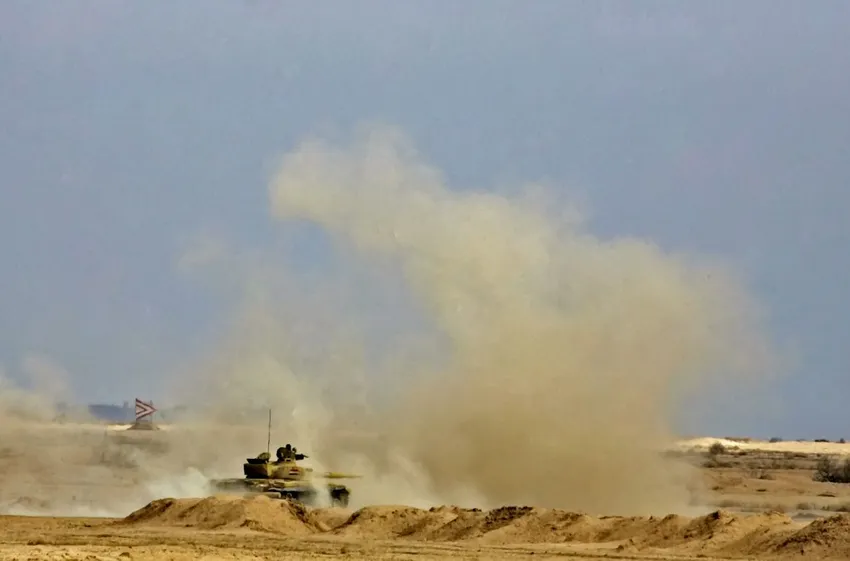 A Soviet model T-72 Iraqi tank from Iraq's 9th Army Mechanized Division takes position during a training session at the Besmaya range near Taji, northeast of Baghdad, 21 February 2006.
