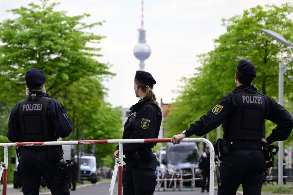 Police officers man a barricade in Berlin, Germany.