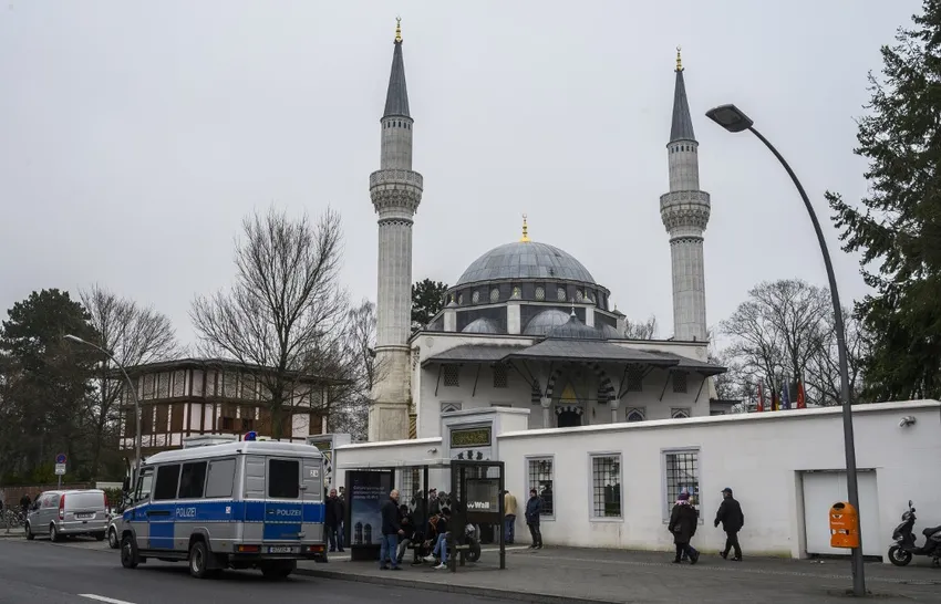A police car is parked in front of the Sehitlik mosque in Berlin on March 22, 2019. The security measures have been reinforced around places of worship for for Muslims in Berlin,