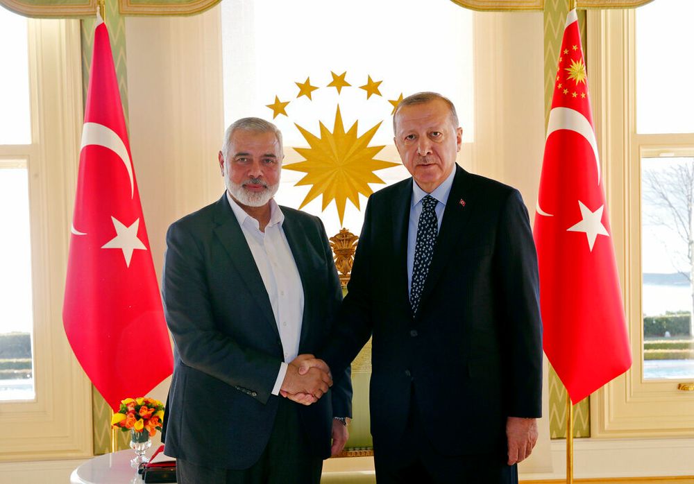 Turkish President Recep Tayyip Erdogan with Hamas leader Ismail Haniyeh