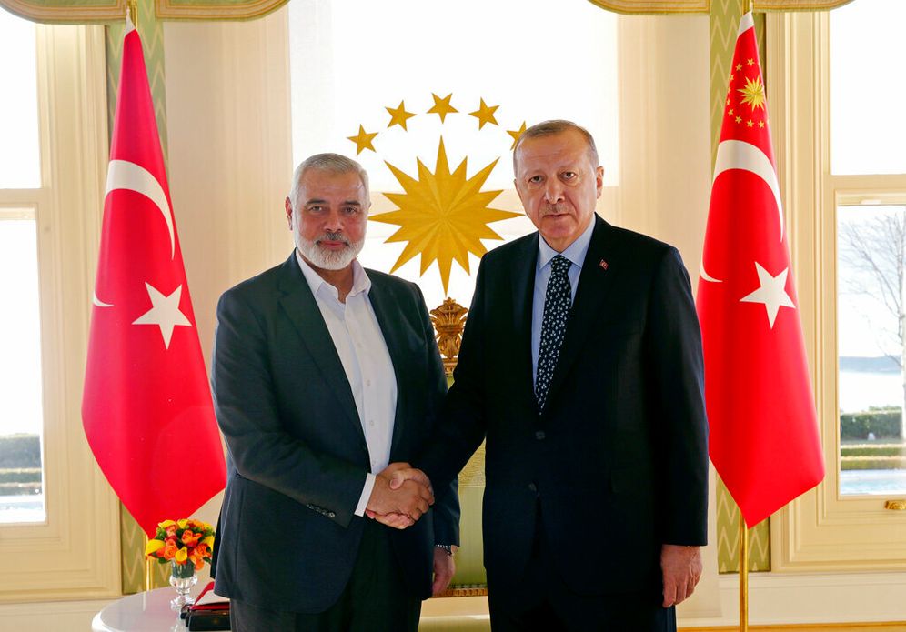 Presidential Press Service via AP, Pool Turkish President Recep Tayyip Erdogan and Hama leader Ismail Haniyeh