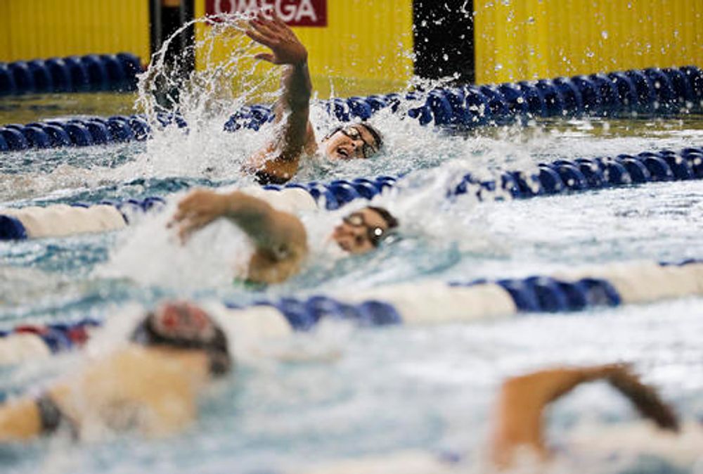 Swimmers compete at the NCAA women's swimming and diving championships at Georgia Institute of Technology in Georgia, United States, on March 19, 2016.