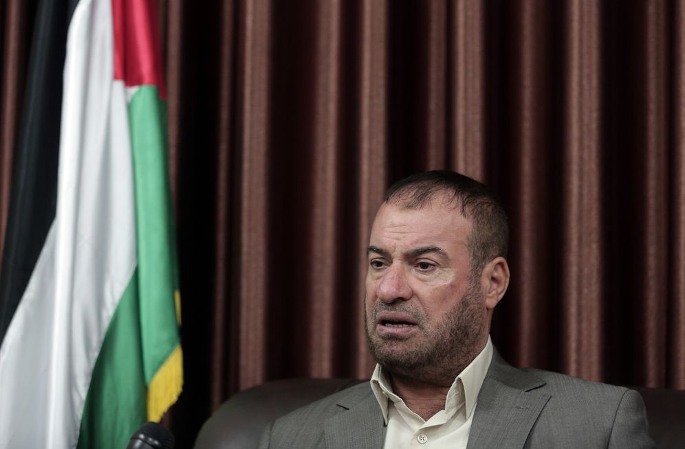 FILE- Palestinian senior Hamas official, Fathi Hammad, speaks to the Associated Press reporter during an interview in his house in town of Beit Lahiya, northern Gaza Strip, Saturday, Sept. 17, 2016.