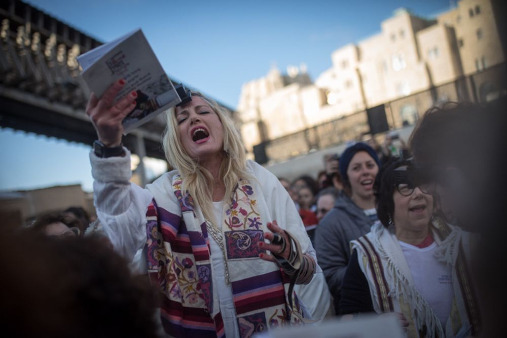 The Women of the Wall pray amid ultra-Orthodox protest at the Western Wall in Jerusalem.