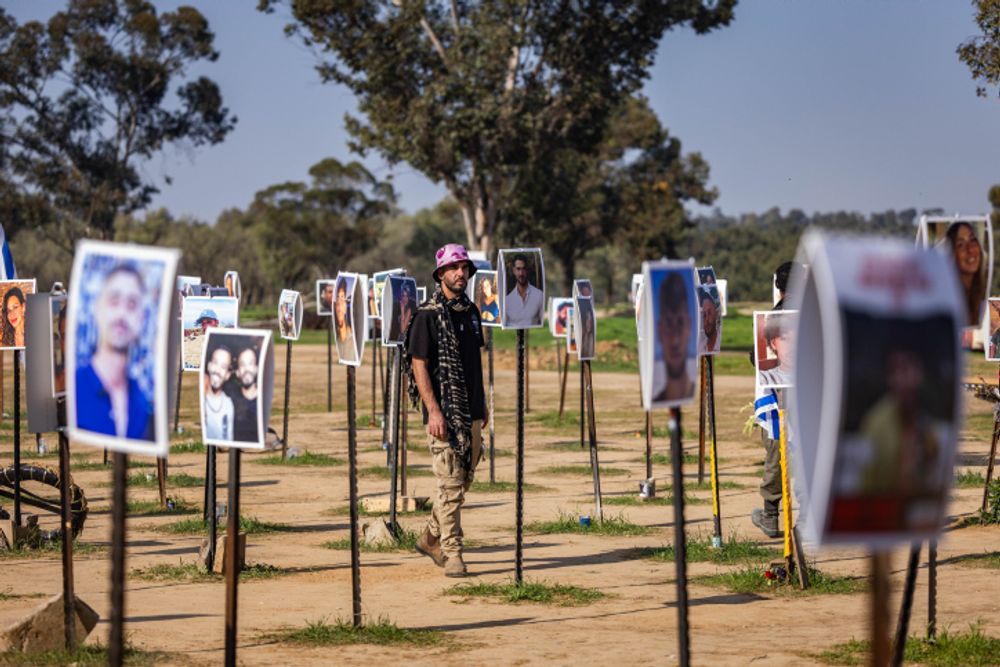 People visit the site of the Nova Music Festival massacre at Kibbutz Re'im, near the Israel-Gaza border.