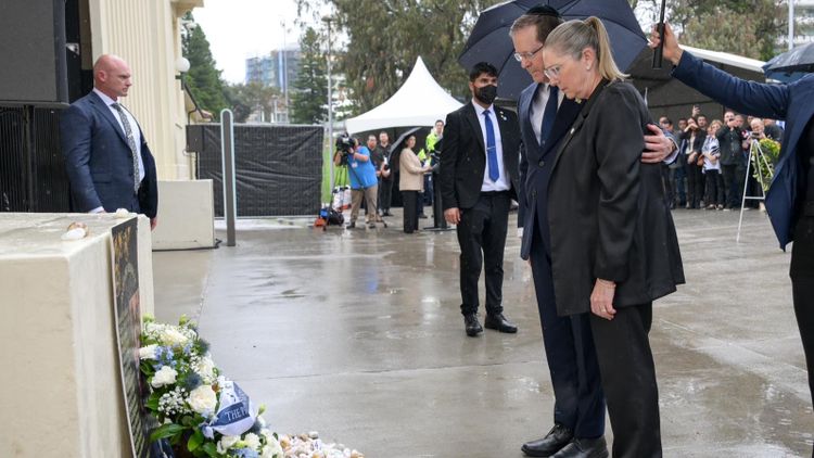 President Isaac Herzog and his wife during a visit to the scene of the attack in Bondi, Sydney, Australia.