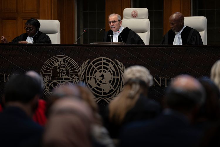 Presiding Judge Nawaf Salam reads the ruling of the International Court of Justice, or World Court, in The Hague, Netherlands, Friday, May 24, 2024