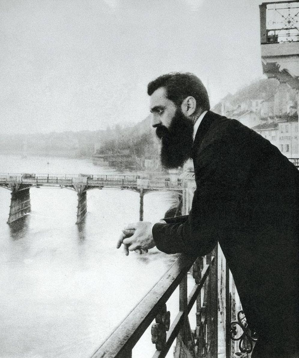 Theodor Herzl on the balcony of the Grand Hôtel Les Trois Rois (Three Kings Hotel) in Basel, Switzerland, during the Fifth Zionist Congress in 1901.
