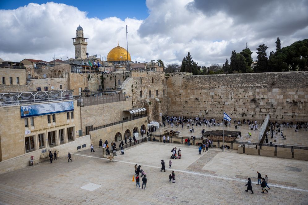 People visit and pray at the Western Wall in Jerusalem's Old City, during the first Friday prayers of the holy month of Ramadan