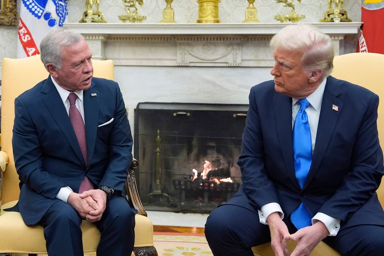 US President Donald Trump speaks with Jordan's King Abdullah II in the Oval Office at the White House, in Washington, DC