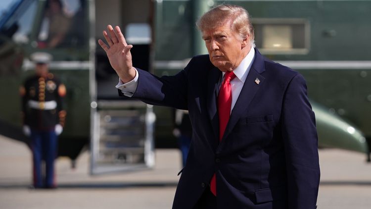 President Donald Trump waves while walking from Air Force One to Marine One at John F. Kennedy International Airport, Monday, Sept. 21, 2026, in New York.