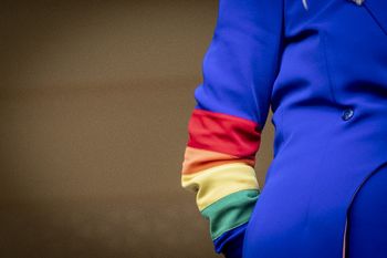 A soccer fan sporting a rainbow-colored sleeve in solidarity with the LGBTQ+ community during the World Cup in Doha, Qatar.
