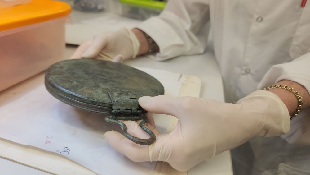The perfectly preserved bronze mirror belonging to an Ancient Greek hetaira courtesan, found near Jerusalem, Israel.