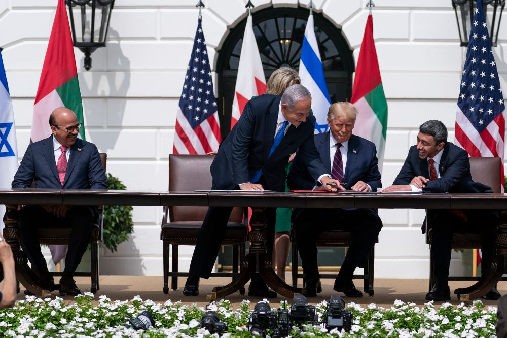 Bahrain FM Khalid bin Ahmed Al Khalifa, (left), Israel's PM Benjamin Netanyahu, US President Donald Trump, and UAE FM Abdullah bin Zayed al-Nahyan signing ceremony on the South Lawn of the White House, on September 15, 2020.