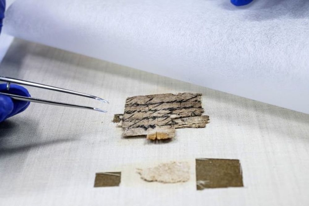 Conservation of the papyrus in the Israel Antiquities Authority Scrolls Conservation Laboratory.