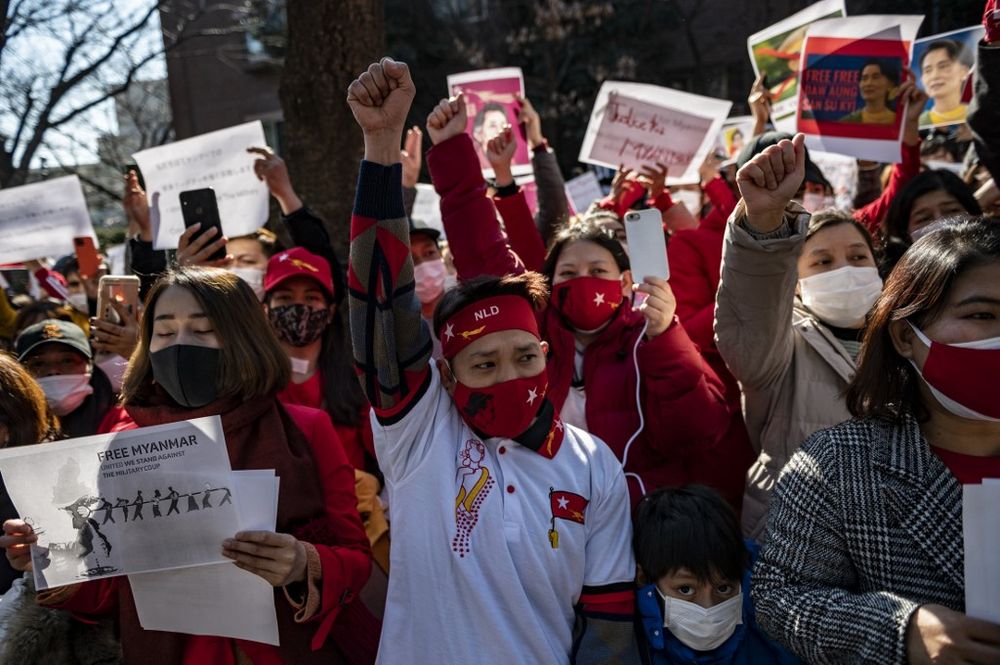 Myanmar activists protest outside the Myanmar embassy in Tokyo on February 7, 2021.