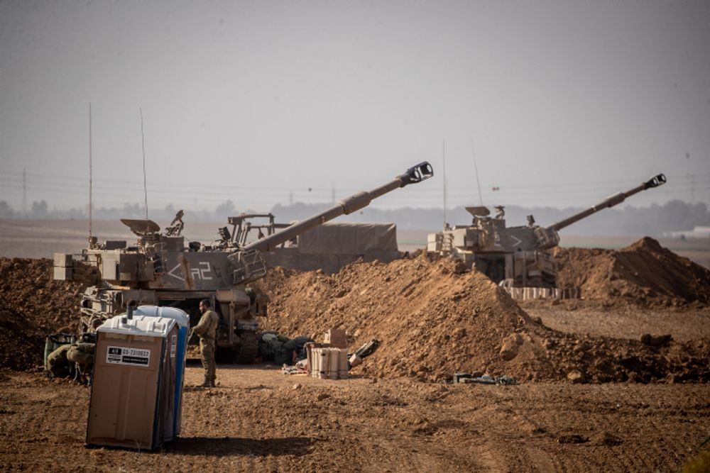 IDF soldiers and artillery at a staging area in Southern Israel, near the border with neighboring Gaza Strip on November 13, 2019.