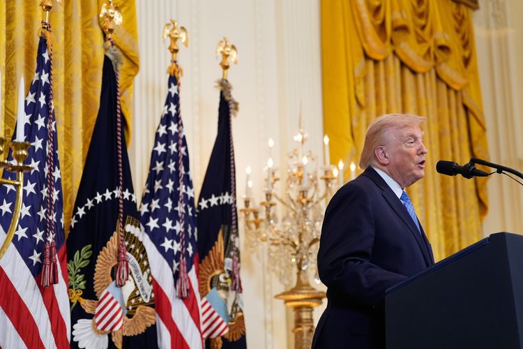 President Donald Trump speaks during a Hanukkah reception in the East Room of the White House, Tuesday, Dec. 16, 2025, in Washington